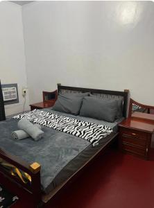 Postel nebo postele na pokoji v ubytování Fernandos Crib