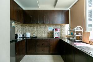 A kitchen or kitchenette at The Bedrooms Hostel Pattaya