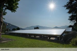 a flat roof on a building with the sun in the sky at Seven Park Hotel Lake Como - Adults Only in Colico