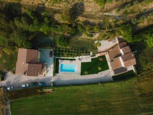 an aerial view of a house with a swimming pool at Civiconr3 in Sona