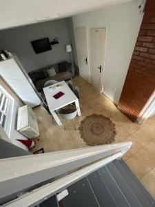 Televízia a/alebo spoločenská miestnosť v ubytovaní Chill apartman