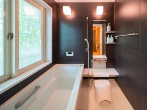 Koupelna v ubytování Logcabin Miyagawa in Nasu -那須 宮川邸-