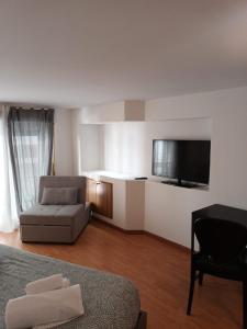 TV a/nebo společenská místnost v ubytování B&B 30 mt dal Duomo + 37 fotografií