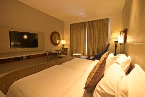 Hotel Amaravathi客房内的一张或多张床位