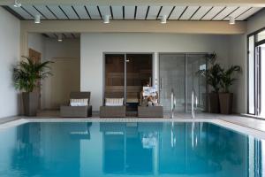 Bazén v ubytování Helnan Marselis Hotel nebo v jeho okolí