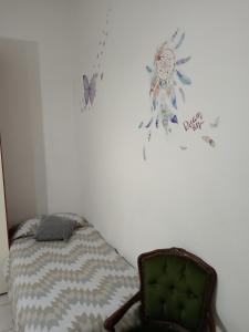 Postel nebo postele na pokoji v ubytování Nomentum House