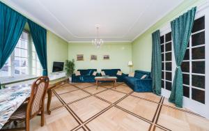 Et opholdsområde på Apartamenty w Pałacu Pod Baranami