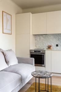 مطبخ أو مطبخ صغير في The Carla Suite Eiffel Tower View