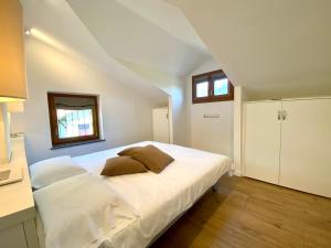 Postel nebo postele na pokoji v ubytování Vittoria Residence + 37 fotografií