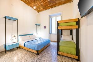 Krevet ili kreveti na sprat u jedinici u okviru objekta Via Milano Central Station Apartment