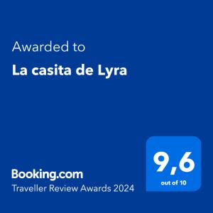 Sertifikat, penghargaan, tanda, atau dokumen yang dipajang di La casita de Lyra