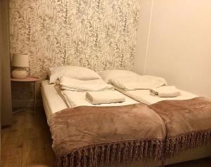 Postel nebo postele na pokoji v ubytování Sands Sopot Apartments