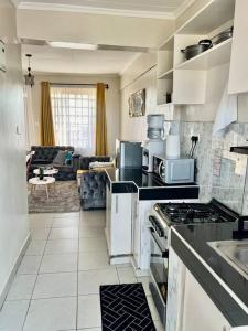 Køkken eller tekøkken på The Cozy Haven