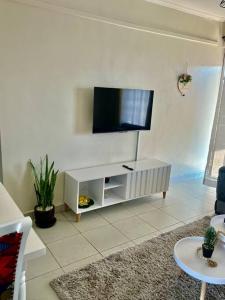 Et tv og/eller underholdning på The Cozy Haven + 6 billeder