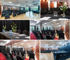 a meeting room with black chairs and a table in a room at Hotel Mościcki in Spała