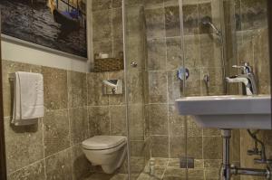 Kúpeľňa v ubytovaní Tartaczna Deluxe Apartments Gdansk