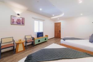 Postel nebo postele na pokoji v ubytování Phuc Lam Hotel & Apartment