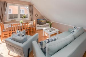 TV a/nebo společenská místnost v ubytování Ferienwohnung Thurbruch