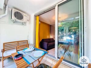 Χώρος καθιστικού στο T1- Leko Réunion 3 étoiles - Proche des plages de l'Ouest