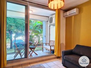 Χώρος καθιστικού στο T1- Leko Réunion 3 étoiles - Proche des plages de l'Ouest +12 φωτογραφίες