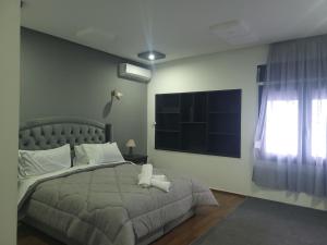 Katil atau katil-katil dalam bilik di VILLA ADAM TANGIER