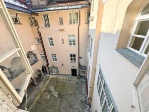 an overhead view of an alley between two buildings at The North Apartment in Ljubljana