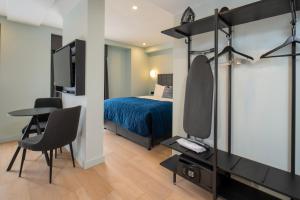 Aparthotel Birmingham客房内的一张或多张床位