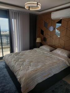 Een bed of bedden in een kamer bij Casa Hills