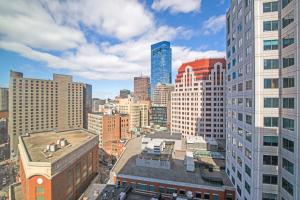an aerial view of a city with tall buildings at Downtown 1BR w Gym WD nr S Station BOS-619 in Boston