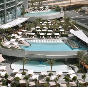 an aerial view of the pool at the resort at Kempinski The Boulevard Dubai in Dubai +127 photos
