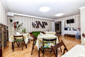 Телевизор и/или развлекательный центр в Bed & Breakfast Good Hotel