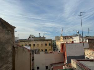 a view of a city from the roofs of buildings at La Fantàstica de la Part Alta in Tarragona