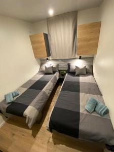 Postelja oz. postelje v sobi nastanitve Mobile Home Leonida, Camp Soline