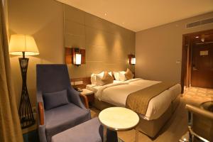 Hotel Amaravathi客房内的一张或多张床位