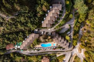 an overhead view of a resort with a swimming pool at Residence Oasi in Limone sul Garda