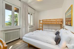 Postel nebo postele na pokoji v ubytování Hotel Martinelli