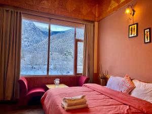 Postel nebo postele na pokoji v ubytování Flüstern Manali