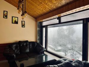 Posezení v ubytování Flüstern Manali