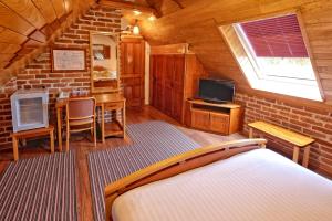 Ein Bett oder Betten in einem Zimmer der Unterkunft Pansion Maltar Varaždin