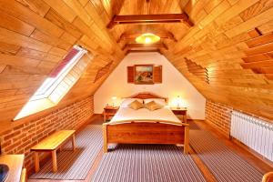 Ein Bett oder Betten in einem Zimmer der Unterkunft Pansion Maltar Varaždin