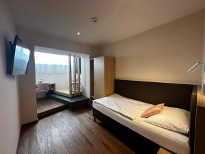 Posteľ alebo postele v izbe v ubytovaní Hotel-Gasthof Graf + 37 fotografií