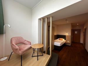 Posteľ alebo postele v izbe v ubytovaní Hotel & Restaurant Graf