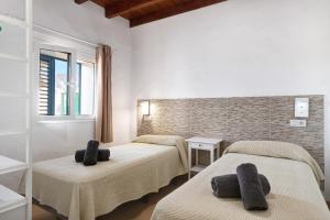 Ένα ή περισσότερα κρεβάτια σε δωμάτιο στο Villa Sueños Zenoneisabel
