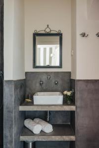 Koupelna v ubytování Apricus Locanda Boutique Hotel