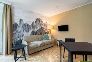 Televízia a/alebo spoločenská miestnosť v ubytovaní Apartment Sonnleitner