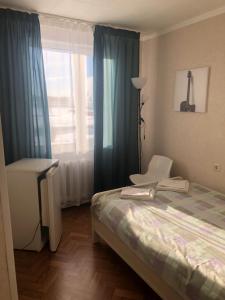Postel nebo postele na pokoji v ubytování Riverside Motel Jelgava