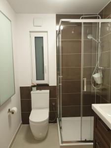 Kúpeľňa v ubytovaní Apartamenty pod Wilczakiem