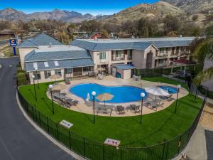 an aerial view of a house with a swimming pool at Comfort Inn & Suites Sequoia Kings Canyon in Three Rivers