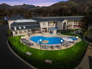 an aerial view of a house with a swimming pool at Comfort Inn & Suites Sequoia Kings Canyon in Three Rivers