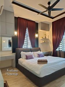 Postel nebo postele na pokoji v ubytování Modern Classy Karliana Homestay Penang